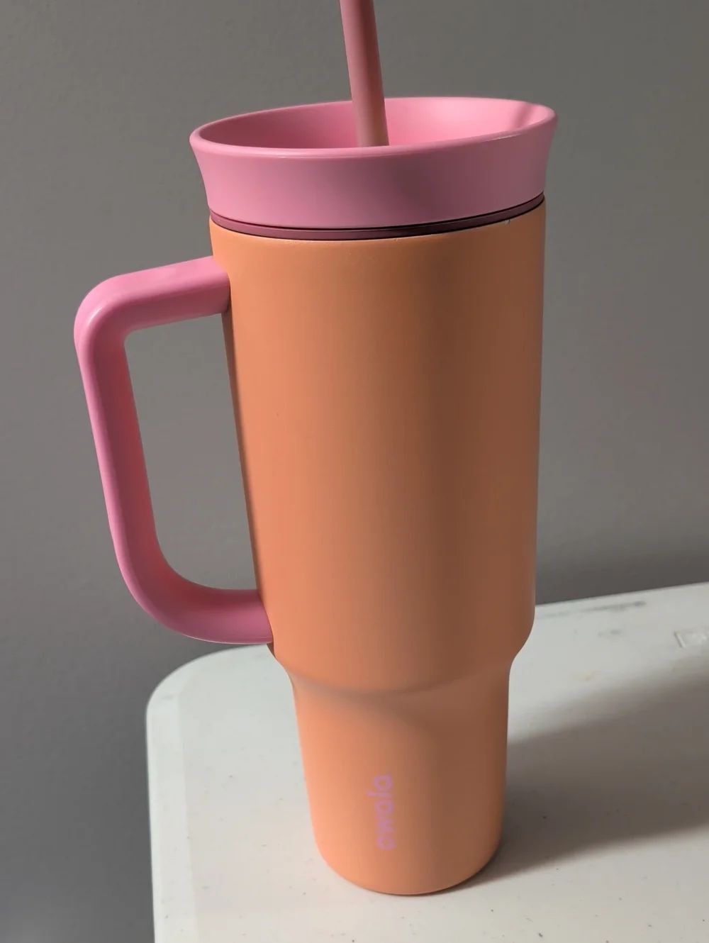 Owala Pink and Peach Insulated Travel Mug with Handle